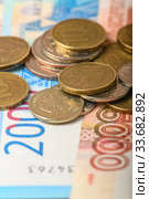 Cash banknotes and coins background. Background of Russian money banknotes. Paper rubles and coins background. Стоковое фото, фотограф Artem Sobov / Фотобанк Лори