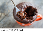 Chocolate pie in a cup filled with a liquid. Стоковое фото, фотограф Tetiana Chugunova / Фотобанк Лори