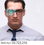 Concept of sensor implanted into human eye. Стоковое фото, фотограф Elnur / Фотобанк Лори