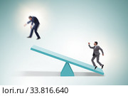 Competition concept with businessman and seesaw. Стоковое фото, фотограф Elnur / Фотобанк Лори