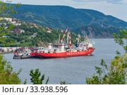 Cargo container ship nuclear-powered icebreaker Sevmorput Russian Corporation FSUE Rosatomflot. Container terminal commercial seaport. Northern Sea Route, Kamchatka Peninsula (2019 год). Редакционное фото, фотограф А. А. Пирагис / Фотобанк Лори