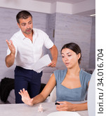 Husband scolding wife painting nails. Стоковое фото, фотограф Яков Филимонов / Фотобанк Лори