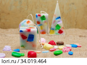 Handmade candles in the shape of a pyramid, cube, cylinder and sphere. Стоковое фото, фотограф Nataliia Zhekova / Фотобанк Лори