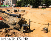 Дорожно-строительный участок. Опрессовка труб. Липецк (2020 год). Редакционное фото, фотограф Евгений Будюкин / Фотобанк Лори