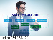 Businessman in safety culture concept. Стоковое фото, фотограф Elnur / Фотобанк Лори