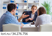 Young family filing divorce papers with lawyer. Стоковое фото, фотограф Elnur / Фотобанк Лори