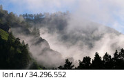 Video of fast moving fog wisps of fog in the mountains near the Altai village of Manzherok. Altai, Russia (2020 год). Стоковое видео, видеограф Сергей Пристяжнюк (Serg Zastavkin) / Фотобанк Лори