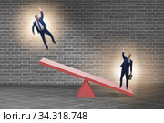 Competition concept with businessman and seesaw. Стоковое фото, фотограф Elnur / Фотобанк Лори