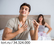 Man suffering from impotency with pill. Стоковое фото, фотограф Elnur / Фотобанк Лори