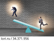 Competition concept with businessman and seesaw. Стоковое фото, фотограф Elnur / Фотобанк Лори