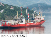 Russian cargo container ship nuclear-powered icebreaker Sevmorput Corporation FSUE Atomflot or Rosatomflot. Container terminal commercial seaport. Pacific Ocean (2019 год). Редакционное фото, фотограф А. А. Пирагис / Фотобанк Лори