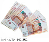 Russian rubbles paper banknotes of five thousand, white background. Стоковое фото, фотограф Кекяляйнен Андрей / Фотобанк Лори