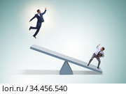 Competition concept with businessman and seesaw. Стоковое фото, фотограф Elnur / Фотобанк Лори