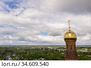 The upper part of the bell tower with a golden dome and a cross of the Church of the Resurrection of Christ in Vichuga, Ivanovo region, Russia (2020 год). Стоковое фото, фотограф Валерий Смирнов / Фотобанк Лори