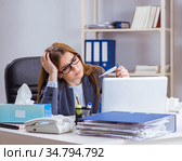 Businesswoman employee sick in the office. Стоковое фото, фотограф Elnur / Фотобанк Лори