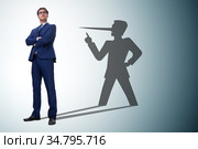 Concept of businessman liar with his shadow. Стоковое фото, фотограф Elnur / Фотобанк Лори