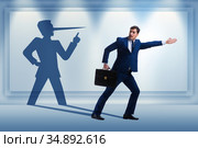 Concept of businessman liar with his shadow. Стоковое фото, фотограф Elnur / Фотобанк Лори