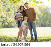 Family with two children. Стоковое фото, фотограф Типляшина Евгения / Фотобанк Лори