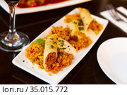Morrocan lamb and harissa rolls with couscous. Стоковое фото, фотограф Яков Филимонов / Фотобанк Лори