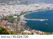Aerial view at the Alanya port and the city. It is a resort town on Turkey's central Mediterranean coast, Turkey (2020 год). Стоковое фото, фотограф Кекяляйнен Андрей / Фотобанк Лори
