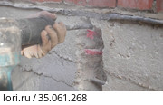 Construction work. Puncher making holes in concrete. Стоковое видео, видеограф Константин Мерцалов / Фотобанк Лори