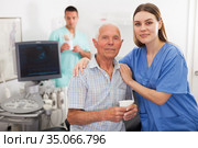 Portrait of USG doctor with patient. Стоковое фото, фотограф Яков Филимонов / Фотобанк Лори
