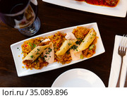 Morrocan lamb and harissa rolls with couscous. Стоковое фото, фотограф Яков Филимонов / Фотобанк Лори