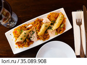 Morrocan lamb and harissa rolls with couscous. Стоковое фото, фотограф Яков Филимонов / Фотобанк Лори