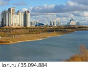 Modern New District Highvill, Presidential Park, Kazakh National University of Arts, Palace of Independence, Palace of Peace and Reconciliation on Ishim River bank. Kazakhstan (2009 год). Редакционное фото, фотограф Валерия Попова / Фотобанк Лори