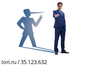 Concept of businessman liar with his shadow. Стоковое фото, фотограф Elnur / Фотобанк Лори