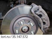Suspension of car for maintenance brakes or alloy hub, close-up view. Стоковое фото, фотограф Кекяляйнен Андрей / Фотобанк Лори