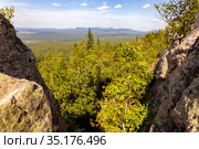 panorama of the Ural mountains of the Taganai ridge of the Chelyabinsk region view from the Aleksandrovskaya Sopka on a sunny summer day. Стоковое фото, фотограф Акиньшин Владимир / Фотобанк Лори