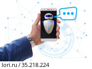 Concept of chat bot in modern business communication. Стоковое фото, фотограф Elnur / Фотобанк Лори