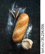 British White Bloomer or Baton loaf bread. Стоковое фото, фотограф Ольга Сергеева / Фотобанк Лори