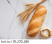 British White Bloomer or Baton loaf bread. Стоковое фото, фотограф Ольга Сергеева / Фотобанк Лори