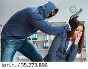 Criminal taking businesswoman as hostage in office. Стоковое фото, фотограф Elnur / Фотобанк Лори