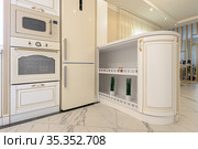 neoclassic style luxury kitchen interior with island. Стоковое фото, фотограф Сергей Старуш / Фотобанк Лори