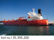 LPG Tanker loading in port. Стоковое фото, фотограф EugeneSergeev / Фотобанк Лори