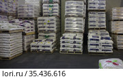 Interior of warehouse of local garden store filled with natural and synthetic multinutrient fertilizers (2019 год). Редакционное видео, видеограф Яков Филимонов / Фотобанк Лори