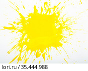 Image of yellow paint spots spilled on background of white paper. Стоковое фото, фотограф Яков Филимонов / Фотобанк Лори