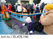 Празднование Широкой Масленицы в парке аттракционов "Диво-остров" (2021 год). Редакционное фото, фотограф Евгений Кашпирев / Фотобанк Лори