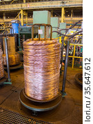 Copper wire rolled up in big bobbin nonferrous metal industry. Стоковое фото, фотограф Кекяляйнен Андрей / Фотобанк Лори