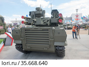 Российский боевой необитаемый многофункциональный робототехнический комплекс «Уран-9» на гусеничном ходу на Международном военно-техническом форуме "Армия-2019" в парке "Патриот", вид сзади. Редакционное фото, фотограф Малышев Андрей / Фотобанк Лори