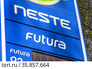 Автозаправочная станция АЗС нефтяной компании "Neste". Рекламный информационный щит на топливо Futura Express крупным планом (2021 год). Редакционное фото, фотограф Grigory_Gez / Фотобанк Лори