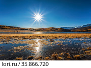 View of Lake Dzhangyskol in the Yeshtykel tract with grass covered with morning frost. Russia, Altai Republic. Стоковое фото, фотограф Наталья Волкова / Фотобанк Лори