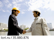 Workman and businessman. Стоковое фото, агентство Ingram Publishing / Фотобанк Лори