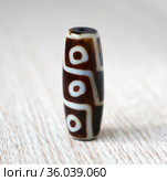 Tibetan Dzi natural beads. 9 eyes dragon for fortune. Стоковое фото, фотограф ElenArt / Фотобанк Лори