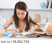 Woman is writing a review of novel. Стоковое фото, фотограф Яков Филимонов / Фотобанк Лори