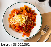Lazos con tomate, spanish pasta in tomato sauce. Стоковое фото, фотограф Яков Филимонов / Фотобанк Лори