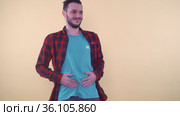Young man rubbing his belly suffering strong stomach ache. Стоковое видео, видеограф Mihail Mihaylov / Фотобанк Лори